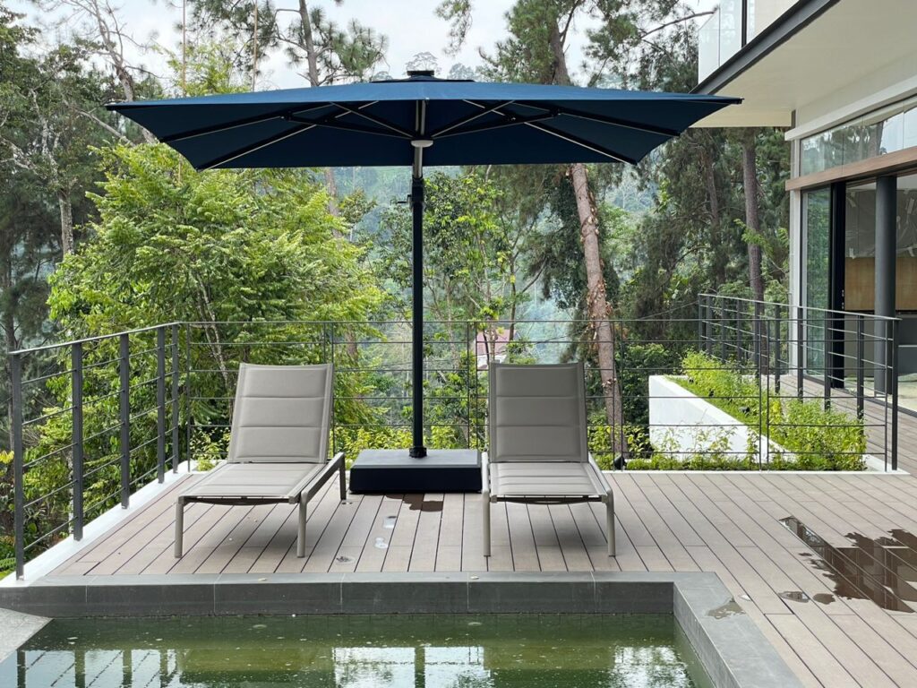 Flat Lounger and Parasol by Triconville. Premium outdoor furniture malaysia